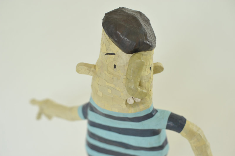 Artist Gives Old Newspapers New Life