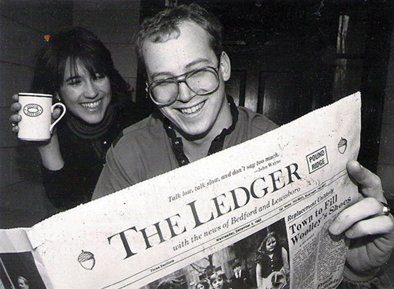 Schult served as editor of The Ledger, a weekly paper in Lewisboro, N.Y. circa 1985. Also pictured is his features reporter Annie Higbee.