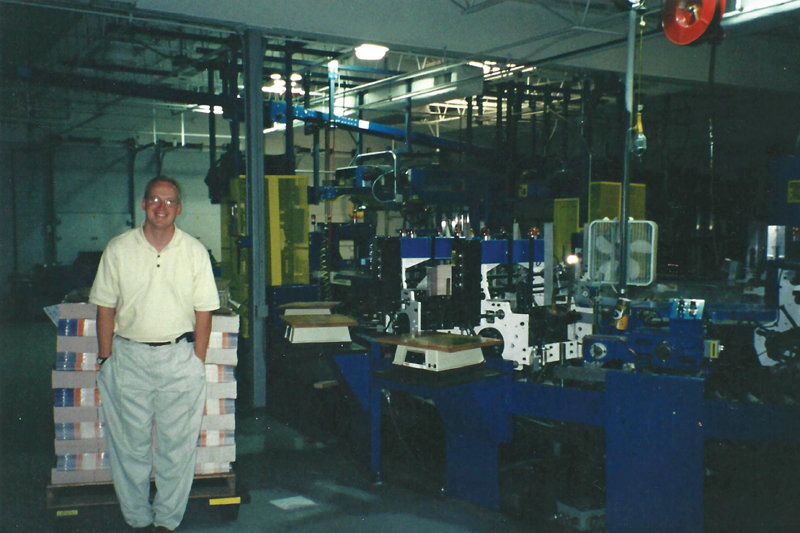 Pictured is Schult circa 1997 at The Journal Times in Racine, Wis. standing in front of a vintage carousel inserter that he would later replace during a major renovation of the paper’s packaging center and insert storage warehouse. 