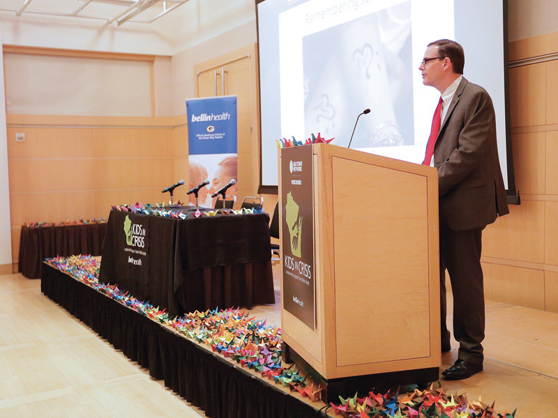 USA TODAY NETWORK-Wisconsin Business Development Director Jim Fitzhenry introduces a speaker at a Kids In Crisis “Call to Action” event in Madison on May 5. The meeting was held on National Children’s Mental Health Awareness Day to call attention to the issues raised in Kids in Crisis, including five solutions for problems uncovered through the series.
