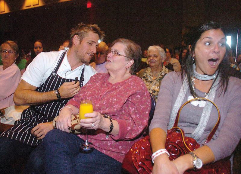 Celebrity chef Curtis Stone interacts with an audience member at the Altoona Mirror’s 2009 Taste of the Alleghenies food show.