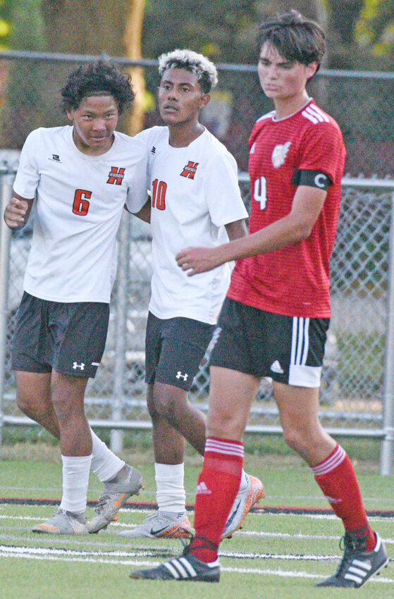 Huron's Ronaldo Pineda, 10, congratulates teammate Mister Min after Min scored the lone goal in a 1-0 victory over Yankton in boys' soccer action, Tuesday at Yankton's Crane-Youngworth Field.