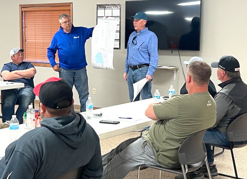Developers Dean Gulbranson and Jim Clark speak with Colman city councilors about the ongoing challenges of building homes in an area still designated as a floodplain. The two are working to raise lot elevations and appeal to FEMA in hopes of removing the designation and reducing costs for future homeowners.