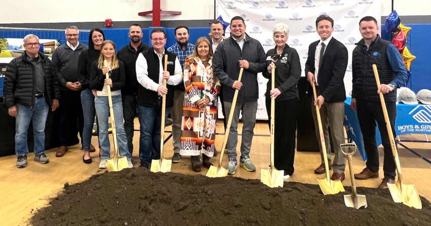 Due to inclement weather, the ceremonial groundbreaking was moved indoors this past Friday for the new Early Childhood Enrichment Center, which will be located on the west end of the Flandreau Public Schools complex and adjacent to the Boys and Girls Club of Moody County. The ECE Center is a project unlike any other in the region, and done in partnership between the Boys and Girls Club of the Northern Plains, the City of Flandreau, the Flandreau Santee Sioux Tribe, Dakota Layers, and the Ramsdell family. County, state, and federal partners also helped see the project through to fruition. Pictured are Scott Ramsdell, Bryan Brietling (Avera - former Senator), Tracy, Nora, and Jason Ramsdell, Flandreau City Mayor Dan Sutton and City  Cohl Turnquist, Flandreau Santee SIoux Tribal Vice-President Cynthia Weddell, BGCNP Corporate Board member Andy Schutz, FSST Council member Nick Flute, CEO BGCNP Jody Hernandez, Evan Ortlieb (Dean of College of Education and Human Sciences at South Dakota State University) and Alex Pugach (Market President First Savings Bank).