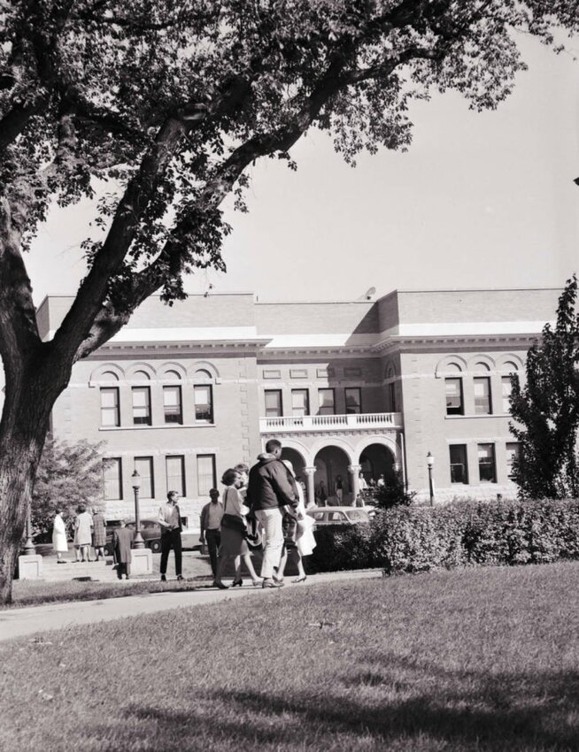 Students walk to class in front of Solberg Hall in 1964.