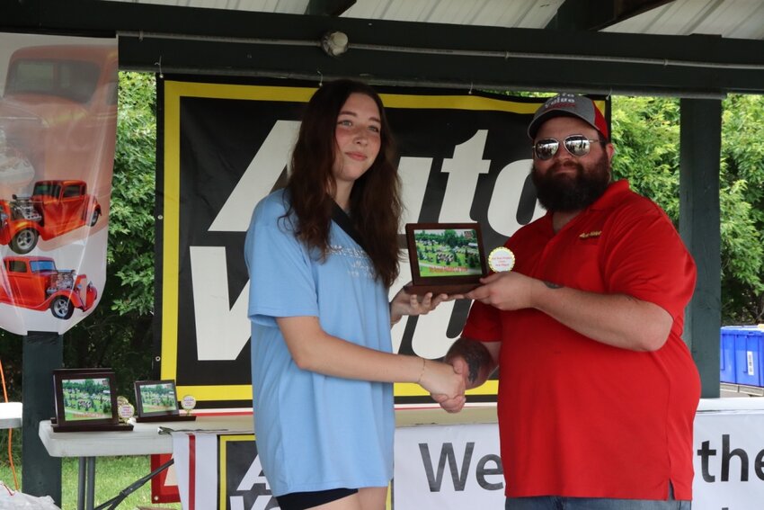 Kyleigh O’Daniel receives the 3rd place Rat Rod/Project award from Criss Rohrbach