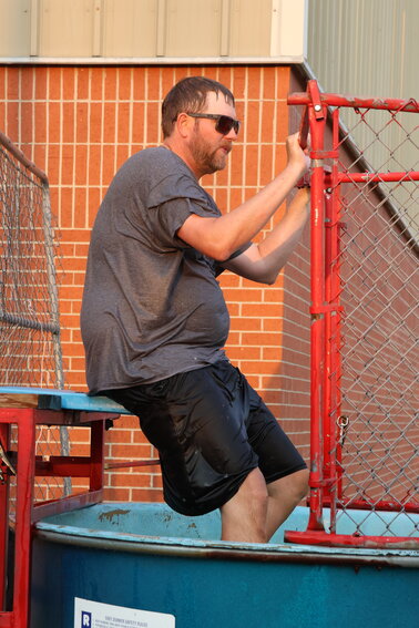 FBLA adviser Mr. Tommy Gregg takes his turn at the dunk tank.