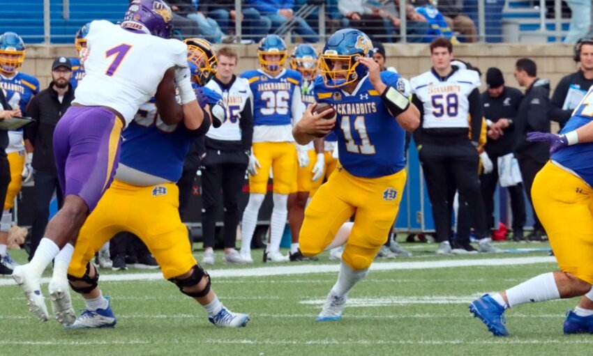 South Dakota State’s Mark Gronowski runs with the ball during a game against Northern Iowa on Oct. 14.