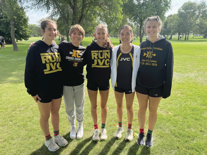 The James Valley Christian girls’ cross country team won the team title during the Redfield Invite on Thursday. From left: Rylin Wipf, Andee Frandsen, Hadasah Olson, Daril Frandsen and Micaiah Brantner.