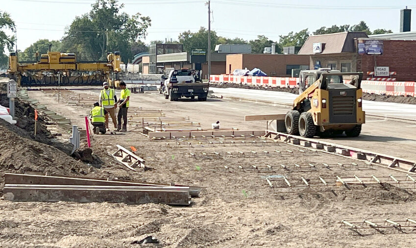 Curb and gutter work are shown in place on the West side of the road between Market and Second St. as the majority of the roadway is now in place.