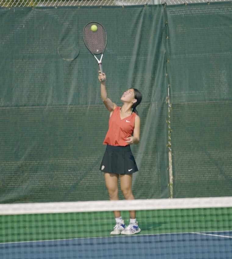 Bobcats tennis player Yuki Zhu serves during a match at the SDHSAA Girls State Tennis Tournament at the Sioux Park Tennis Complex in Rapid City on Thursday morning.