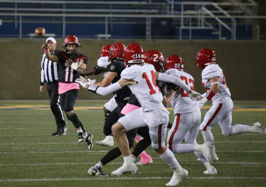 Bobcats quarterback Gavin Anderson (11) throws on the run in the second quarter of a game against Yankton at Dana J. Dykhouse Stadium in Brookings on Oct. 11.