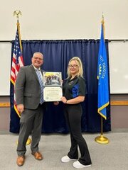 Sheryl Kleinsasser, right, with the Huron Police Department, shown with Brent Kempema, chief deputy Attorney General, recently completed the basic tellecommunicator certification course.