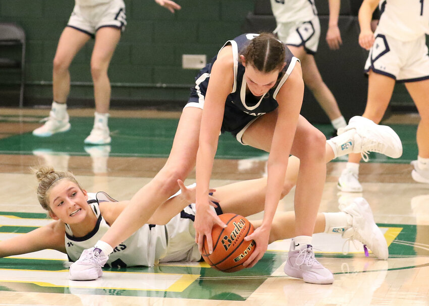 Sioux Valley and Dakota Valley battle at the girls State A Basketball Tournament in Spearfish on Thursday.