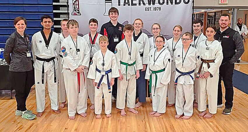Front row, from left are Kain Ladegaard, Sawyer Yackley, Jaxon Southern, Ruby VanderWeerd, Sawyer Franklin and Ella Kramer. Back row, from left, are coach Kelli Anawski, Nischal Khanal , Garrett Ysbrand, Trestin Johnson, Stephen Anawski, Jasmine Anawski, Blythe Jones, Clare Overby, Tanner Johnson and head coach Mark Anawski.
