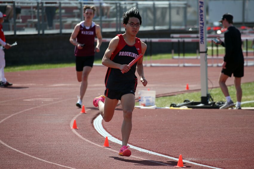 Brookings' Ernest Ting runs in the 4x800 relay on Tuesday afternoon at the Brookings Alumni Meet.