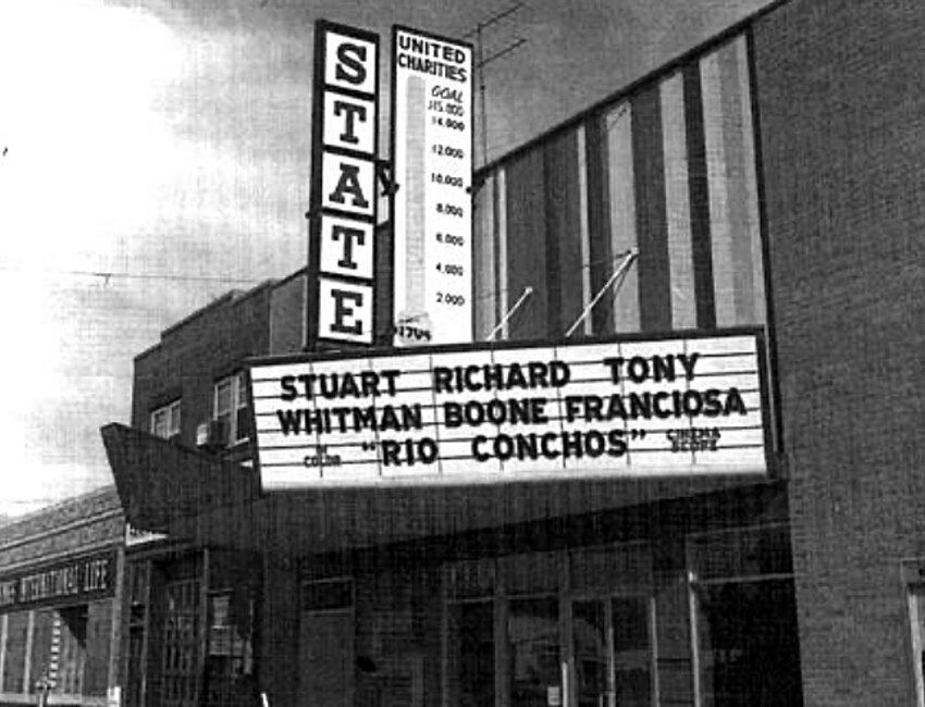 State Theater on Main Street in Brookings — current home to Powershop Gym — proudly displays the United Charities (now Brookings Area United Way) fundraising progress above the marquee, circa 1965.