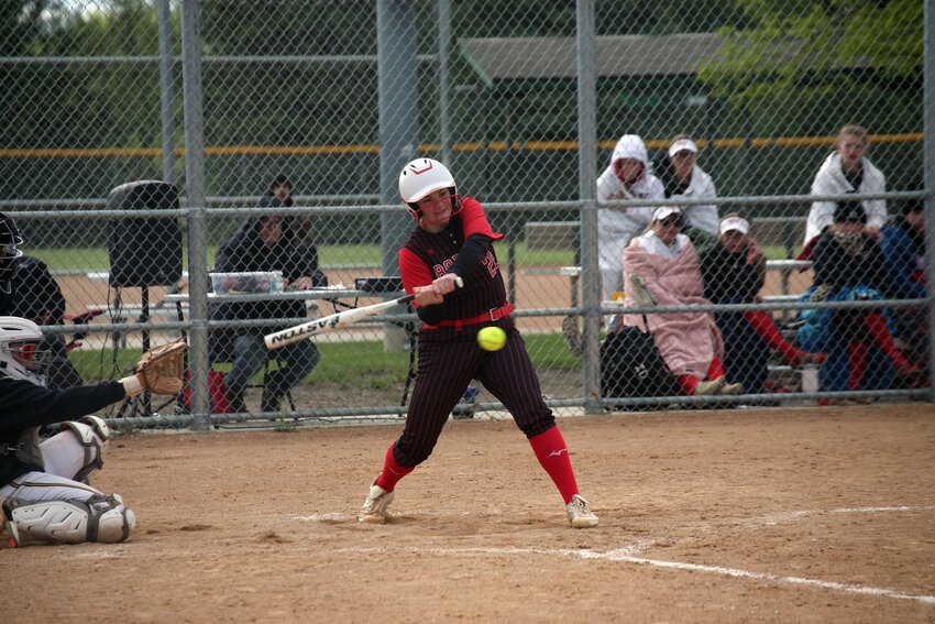 Brookings’ Tess Burns hits the ball during a 4-1 victory over Mitchell on Saturday afternoon at Southbrook Softball Complex in Brookings. Burns had two RBIs and also pitched five innings and had 10 strikeouts.