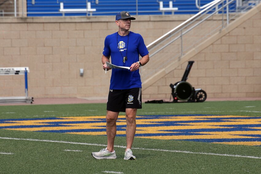 South Dakota State defensive coordinator Brian Bergstrom stands during practice on Wednesday morning at Dana J. Dykhouse Stadium in Brookings.