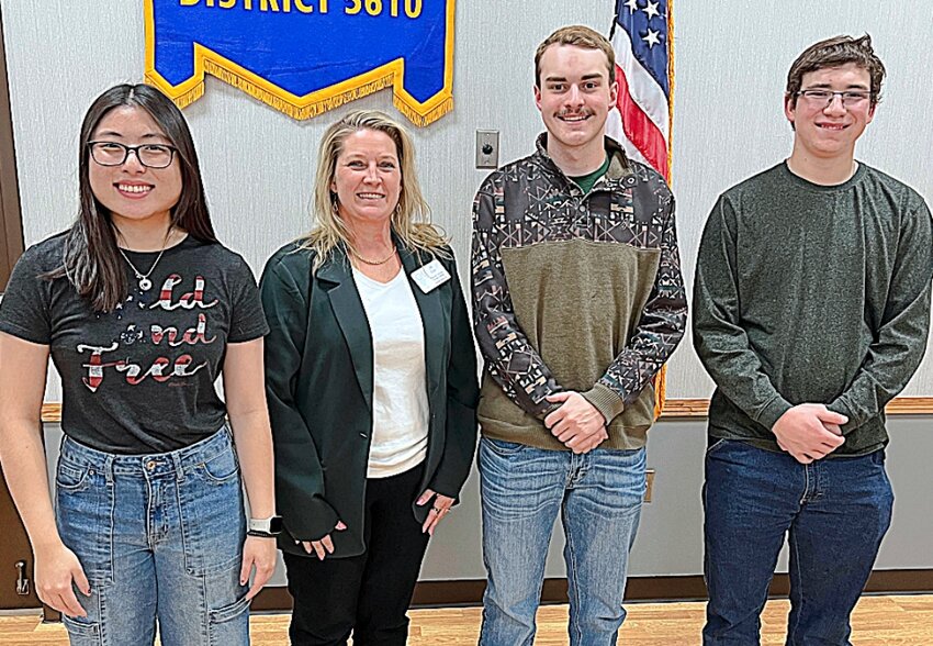 Brookings Rotary Club President Jennifer Olson, center, congratulates recent high school graduates and scholarship winners Easton Overbo of Watertown, Sioux Valley High School; and Maya Jensen of Elkton, Elkton High School. Each student received a $1,000 scholarship from the Brookings club to attend South Dakota State University.