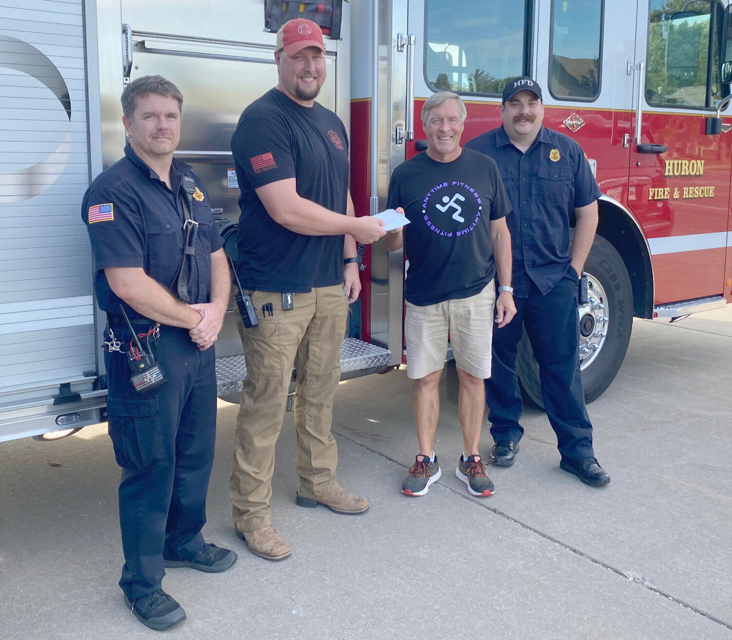 Anytime Fitness owner, Dan Wehde, presents Firefighter Ben Sharon, along with firefighters Jeremy James (left) and Josh Sterrett (right) with a donation in response to the club’s recent “Climb for a Cause” fundraiser. Contributions from community and club members generated $700 in support of the local Fire Department. Thank you to all who Climbed for a Cause this year or made a donation.
Community member, Janet Erickson, deserves recognition for her generous contribution once again this year.