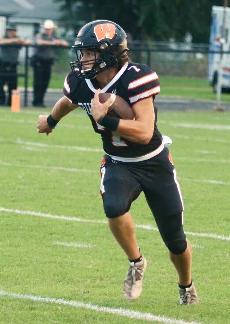Ethan Mullins returns a kickoff earlier this season against Lexington. Mullins and the Wayne Bulldogs travel to Wynnewood for a rare Saturday game at 1 p.m. against the Savages.