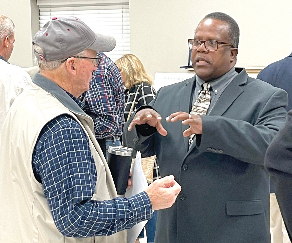 Ron Brown, Oklahoma Department of Transportation Dist. 3 Engineer over the McClain County area, talks with local residents about the U.S. Interstate 35 and State Highway 9 interchange.