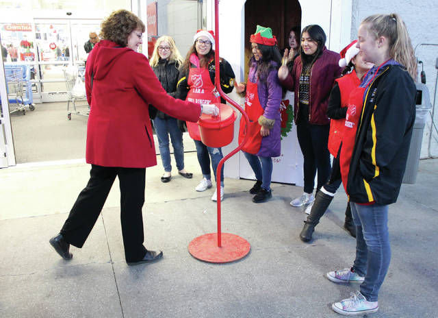 Photos SmithCotton girls swim team rings bells for Salvation Army